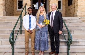 2026 Mr and Miss FHU, standing alongside President David Shannon on the steps of Old Main