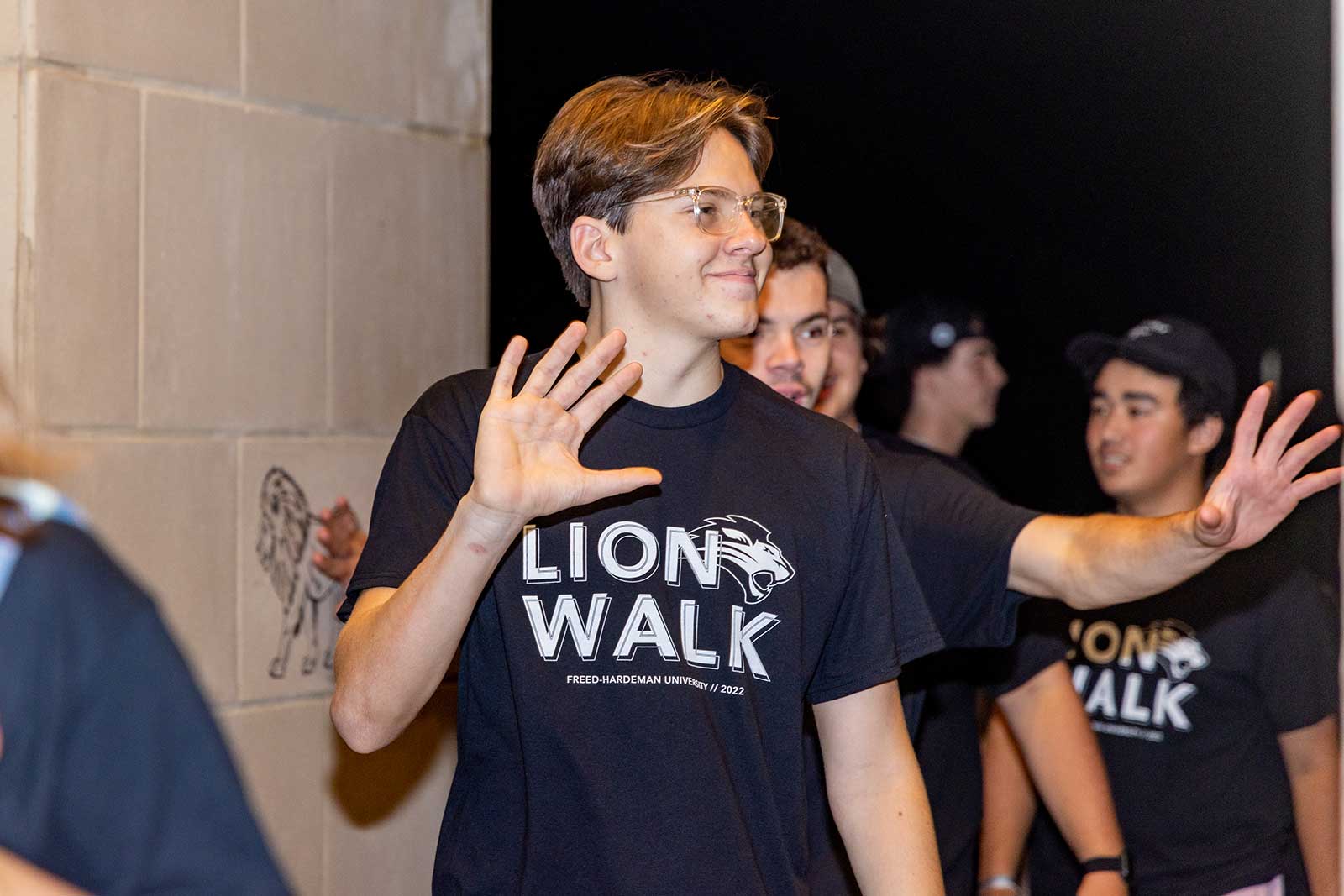 students in lion walk