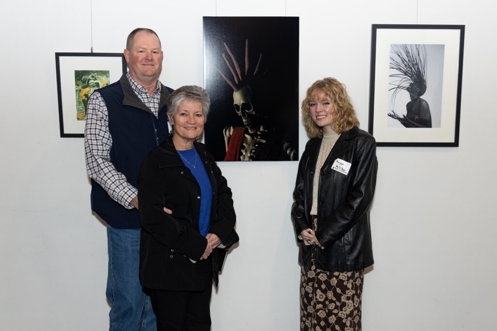 (l to r) Parents Brian and Angie Milliken stand with their daughter, Morgan Milliken, who presented a photo from her series “The Difference a Wig Can Make.”