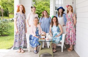 A group of women gather for a tea party
