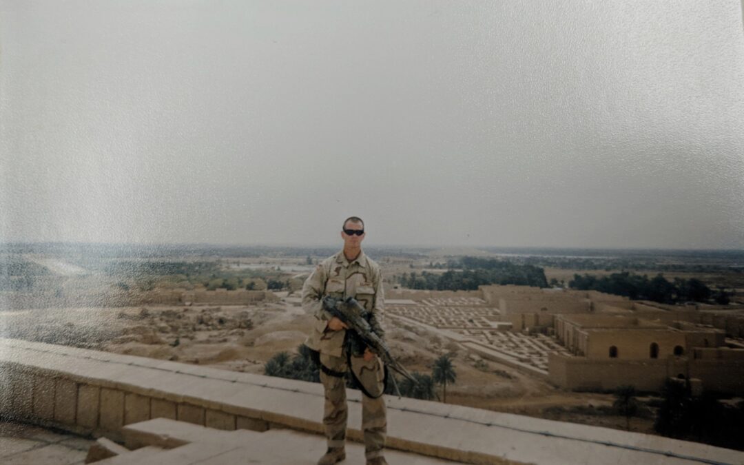Blake Griswell standing on the roof of Saddam Hussein's palace overlooking the Ruins of Babylon.