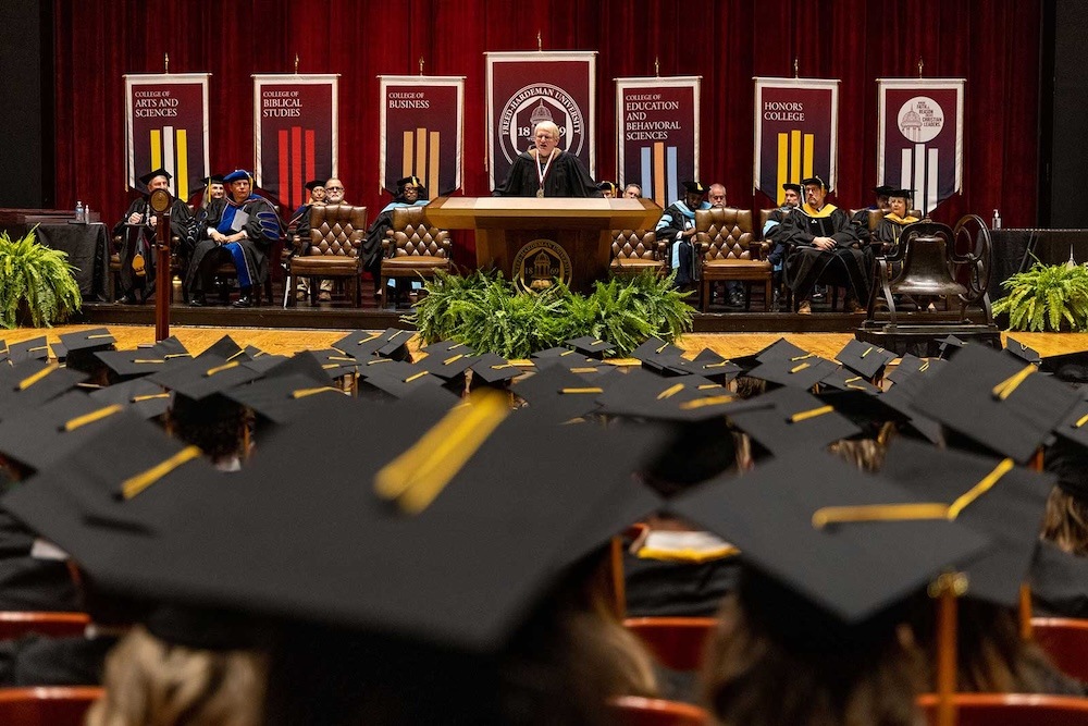 students listening during their graduation