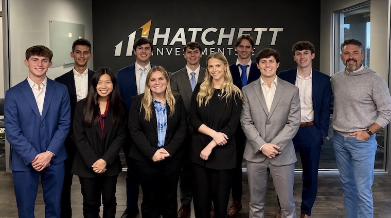The FHU Hatchett Investment Team poses for a photo