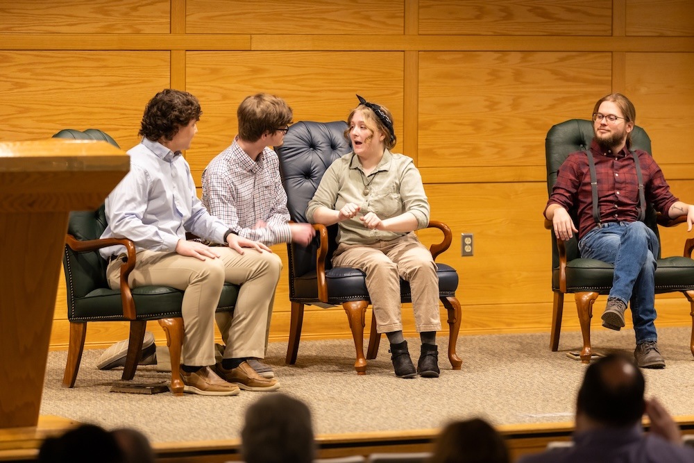 (l to r) Caleb Sims, Garret Moore, Maci Cagle and FHU alumnus Seth Wilson portray the Southern Oaks residents during the Living Memories production held Tuesday, March 11, 2025, in Ayers Auditorium. 