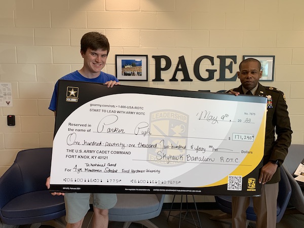 (l to r) Parker Pugh is presented with the Minuteman Scholarship by Bernard House LTC, FA, Professor of Military Science University of Tennessee at Martin/Murray State University.