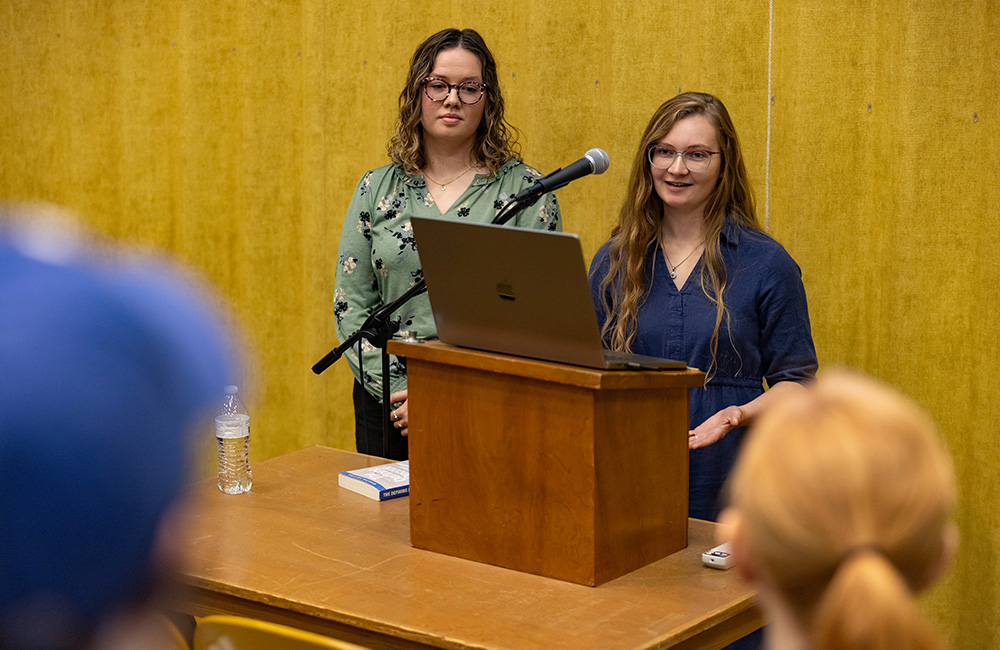 (L to R) FHU seniors Ana Holland and Sarah Henley present “Are You Wasting Your Twenties?”