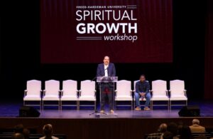 Dr Burleson introducing the next speaker at the FHU Spiritual Growth Workshop