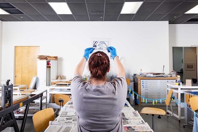 A student working on an art project